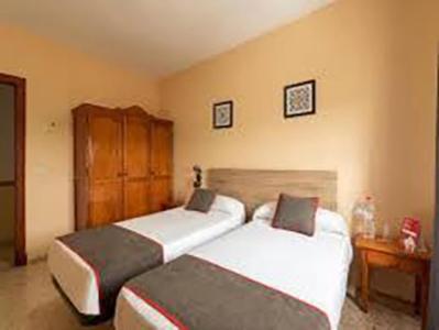 Hostal-Restaurante El Paisano Guadalema de los Quinteros Esterno foto